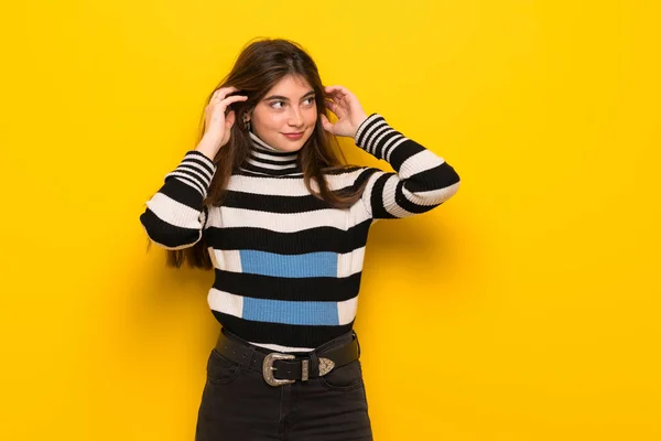 Young Woman Yellow Wall Having Doubts Thinking — Stock Photo, Image