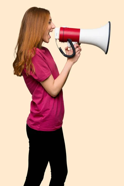 Young Redhead Girl Shouting Megaphone Announce Something Lateral Position Isolated — ストック写真