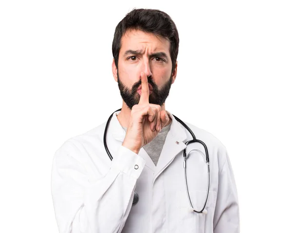 Young Doctor Making Silence Gesture White Background — Stock Photo, Image