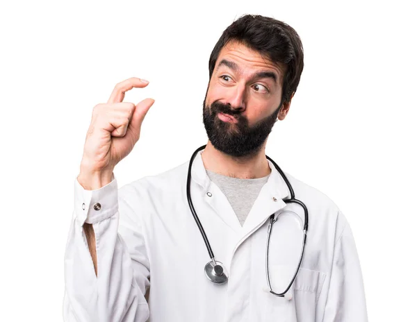 Young Doctor Making Tiny Sign White Background — Stock Photo, Image