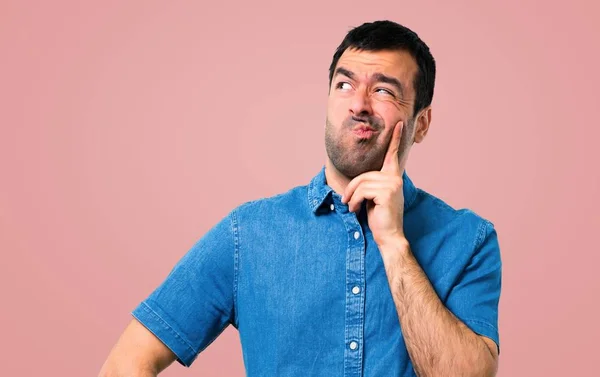 Handsome Man Blue Shirt Having Doubts Confuse Face Expression Pink — Stock Photo, Image