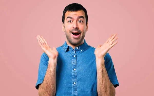 Handsome Man Blue Shirt Surprise Shocked Facial Expression Pink Background — Stock Photo, Image