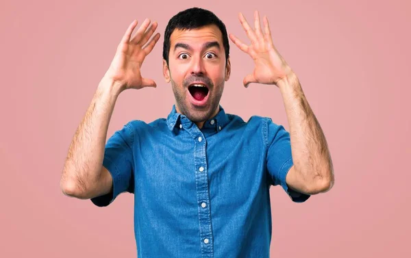 Handsome Man Blue Shirt Surprise Shocked Facial Expression Pink Background — Stock Photo, Image