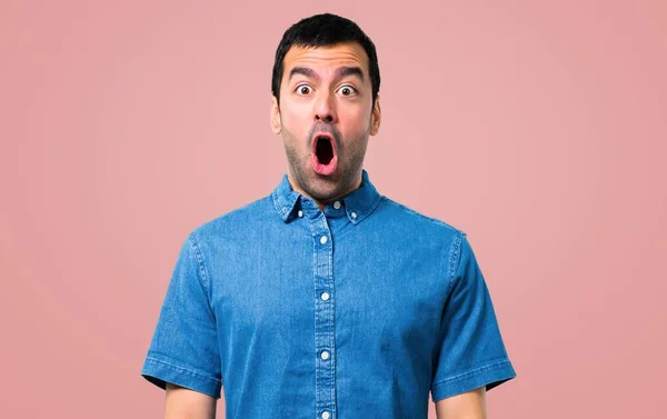 Handsome Man Blue Shirt Surprise Shocked Facial Expression Pink Background — Stock Photo, Image