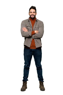 Silah tutmak sakallı yakışıklı adam tam uzunlukta çekim ön bulunduğu izole beyaz arka plan üzerinde geçti.