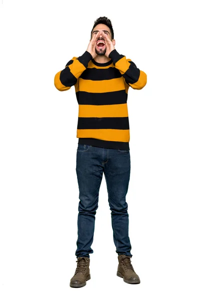 줄무늬 스웨터 소리와 배경에 발표와 잘생긴 남자의 — 스톡 사진