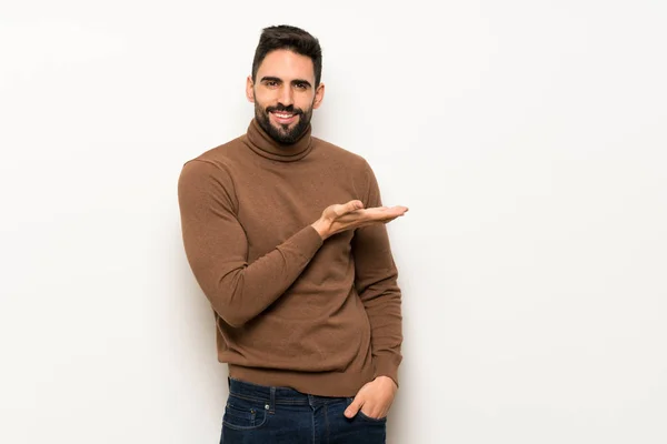 Handsome Man White Wall Presenting Idea While Looking Smiling — Stock Photo, Image