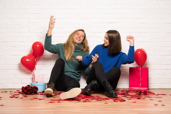 Couple in valentine day enjoy dancing while listening to music at a party