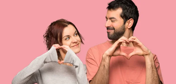 Couple Valentine Day Making Heart Symbol Hands Isolated Pink Background — Stock Photo, Image
