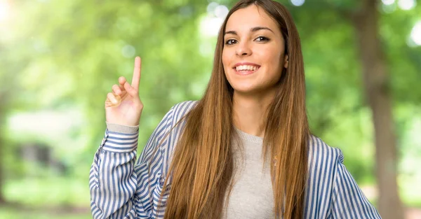 Young Girl Striped Shirt Showing Lifting Finger Sign Best Outdoors — Stock Photo, Image