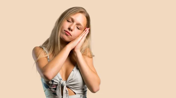 Young Blonde Woman Making Sleep Gesture Adorable Sweet Expression Ocher — Stock Photo, Image