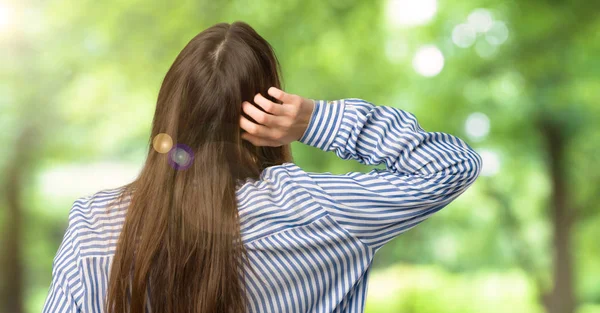 Young Girl Striped Shirt Back Position Looking Back While Scratching — Stock Photo, Image