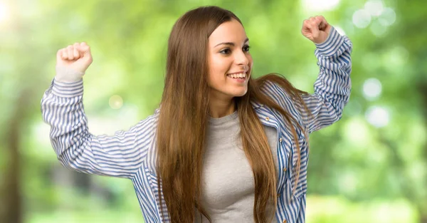 Young Girl Striped Shirt Happy Jumping Outdoors — Stock Photo, Image