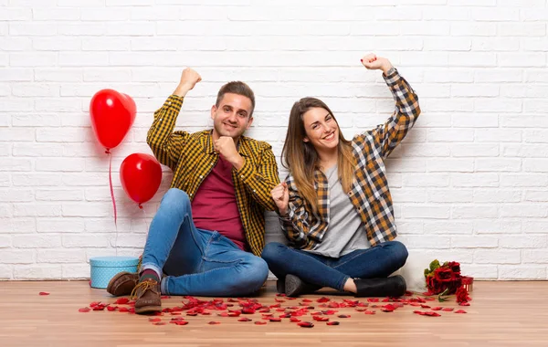 Pareja Día San Valentín Interior Celebrando Una Victoria —  Fotos de Stock