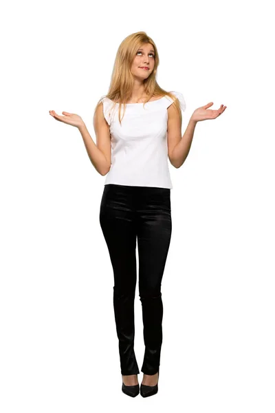 Young Blonde Woman Having Doubts While Raising Hands Shoulders Isolated — Stock Photo, Image