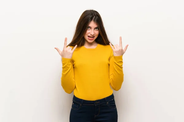 Young Woman Yellow Sweater Making Rock Gesture — Stock Photo, Image