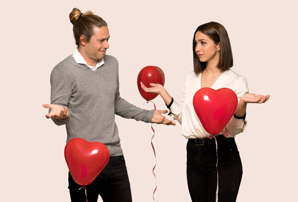 Couple in valentine day unhappy and frustrated with something because not understand something over isolated background