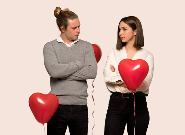 Couple in valentine day feeling upset over isolated background