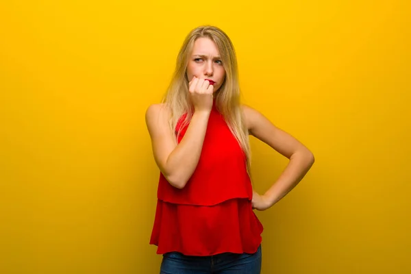 Young Girl Red Dress Yellow Wall Having Doubts — Stock Photo, Image