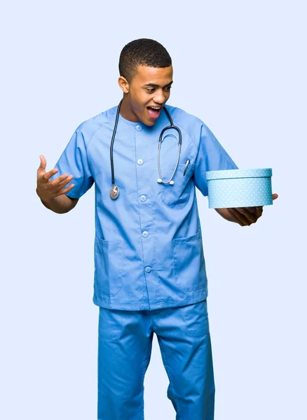 Surgeon Doctor Man Holding Gift Box Hands Isolated Background — Stock Photo, Image