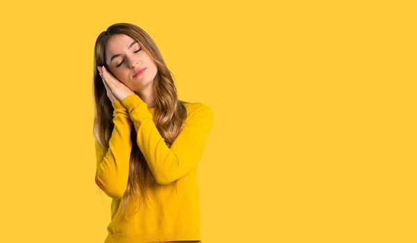 Young Girl Yellow Sweater Making Sleep Gesture Dorable Expression Isolated — Stock Photo, Image