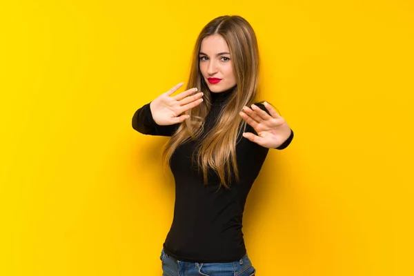 Young Pretty Woman Yellow Background Little Bit Nervous Scared Stretching — Stock Photo, Image