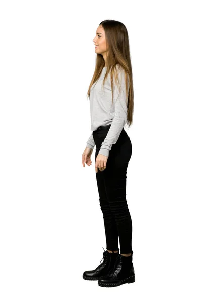Genç Kızın Izole Beyaz Arka Planda Lateral Pozisyonda Tam Uzunlukta — Stok fotoğraf