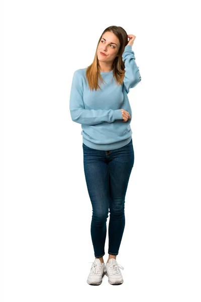 Full Body Blonde Woman Blue Shirt Having Doubts While Scratching — Stock Photo, Image