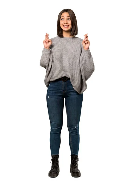 指の交差と分離の白い背景の上の最高の希望を持つ若い女性のフルレングス ショット — ストック写真