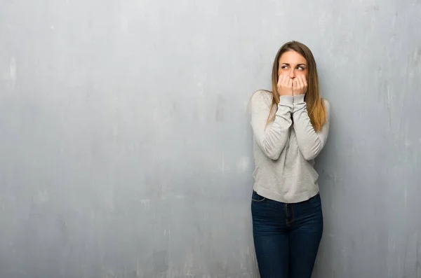 Young Woman Textured Wall Little Bit Nervous Scared Putting Hands — Stock Photo, Image