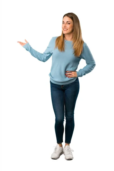 Full Body Blonde Woman Blue Shirt Pointing Back Presenting Product — Stock Photo, Image