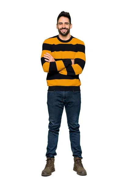 分離の白い背景の正面位置で交差腕を維持するストライプのセーターとハンサムのフルレングスのショット — ストック写真