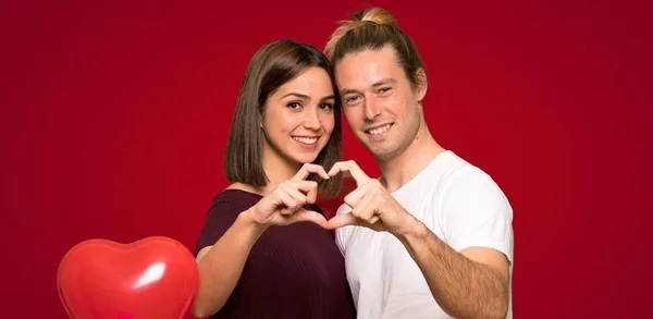 Couple Valentine Day Making Heart Hands Red Background — Stock Photo, Image