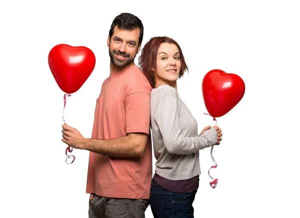 Pareja Día San Valentín Con Globos Con Forma Corazón Sobre —  Fotos de Stock
