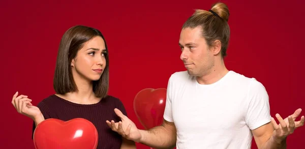 Couple Valentine Day Having Doubts Red Background — Stock Photo, Image