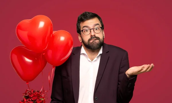 Mann Valentinstag Mit Zweifeln Während Hände Und Schultern Über Roten — Stockfoto
