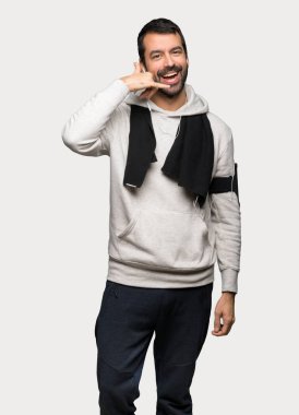 Spor adam telefon jest yapma. Bana arka işaret izole gri arka plan üzerinde de