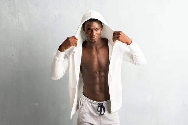Strong african american  sportman wearing sweatshirt