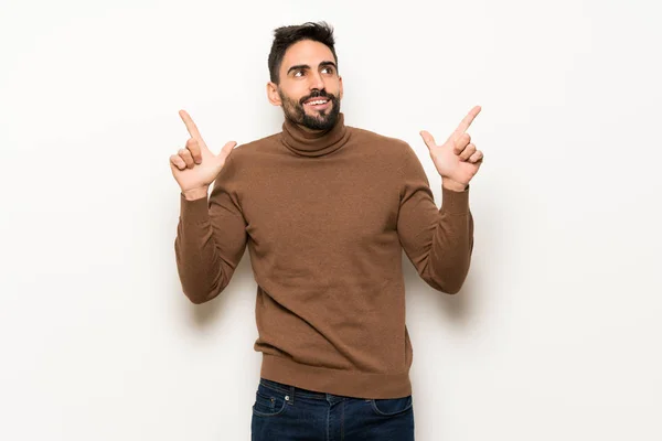 Handsome Man White Wall Pointing Index Finger Great Idea — Stock Photo, Image