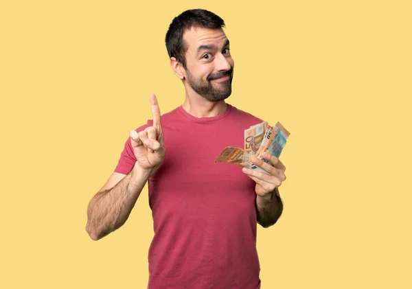 Mann Der Viel Geld Nimmt Zeigt Und Hebt Einen Finger — Stockfoto