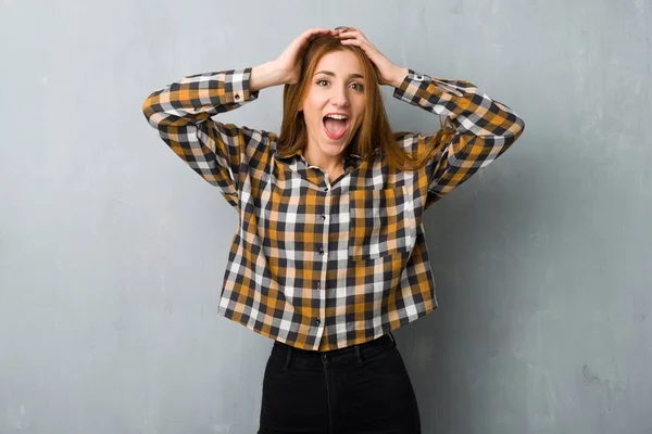 Young Redhead Girl Grunge Wall Surprise Shocked Facial Expression — Stock Photo, Image