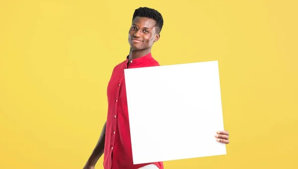 Jonge Afro Amerikaanse Man Met Een Leeg Wit Bordje Voor — Stockfoto