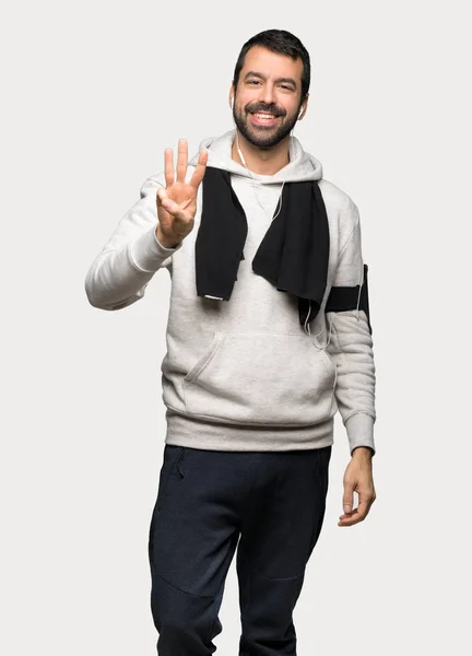 Sport Man Happy Counting Three Fingers Isolated Grey Background — Stock Photo, Image