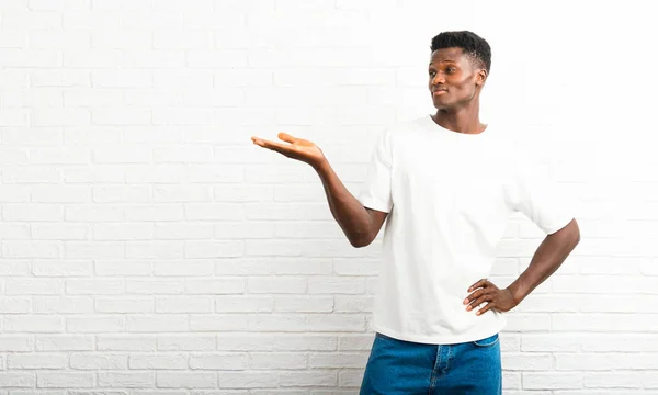 Dark Skinned Man Holding Copyspace Imaginary Palm Insert — Stock Photo, Image