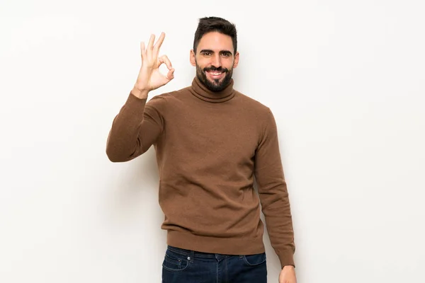 Schöner Mann Über Weiße Wand Der Mit Fingern Ein Zeichen — Stockfoto