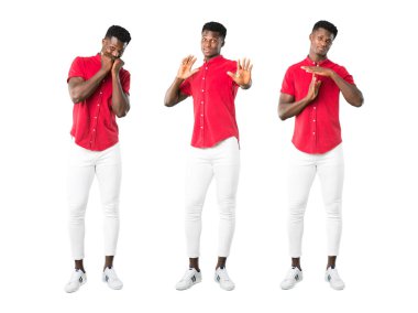 Genç Afro-Amerikan adam biraz gergin dur jest yapıyor kümesidir