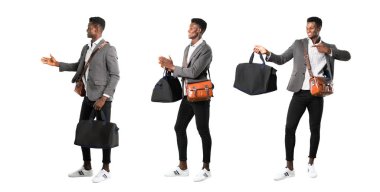 Afrika kökenli Amerikalı iş adamı ile gülümseyen ve izole beyaz arka plan üzerinde alkış bavul seyahat seti