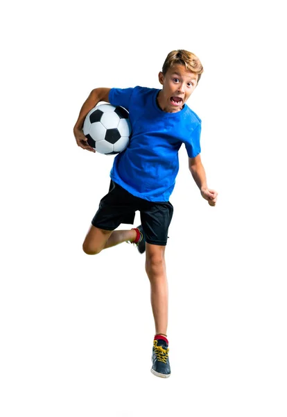Ένα Ολόσωμο Πλάνο Αγόρι Παίζει Ποδόσφαιρο Και Πηδώντας Απομονωμένες Άσπρο — Φωτογραφία Αρχείου