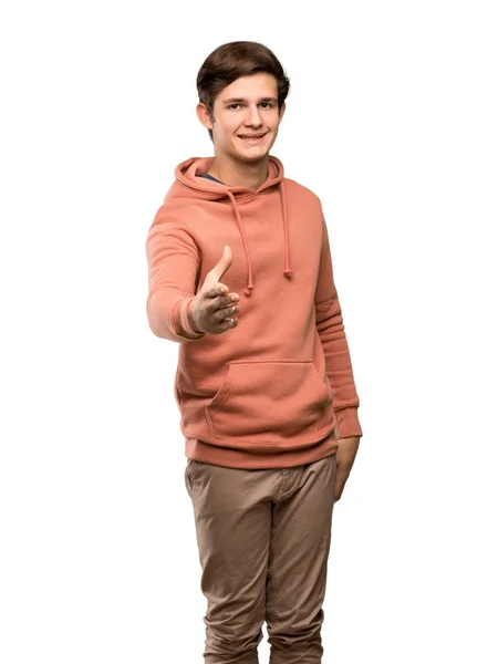 Teenager Man Sweatshirt Shaking Hands Closing Good Deal Isolated White — Stock Photo, Image