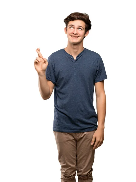 Teenager Mann Mit Daumendrücken Und Wünschen Das Beste Über Isolierten — Stockfoto